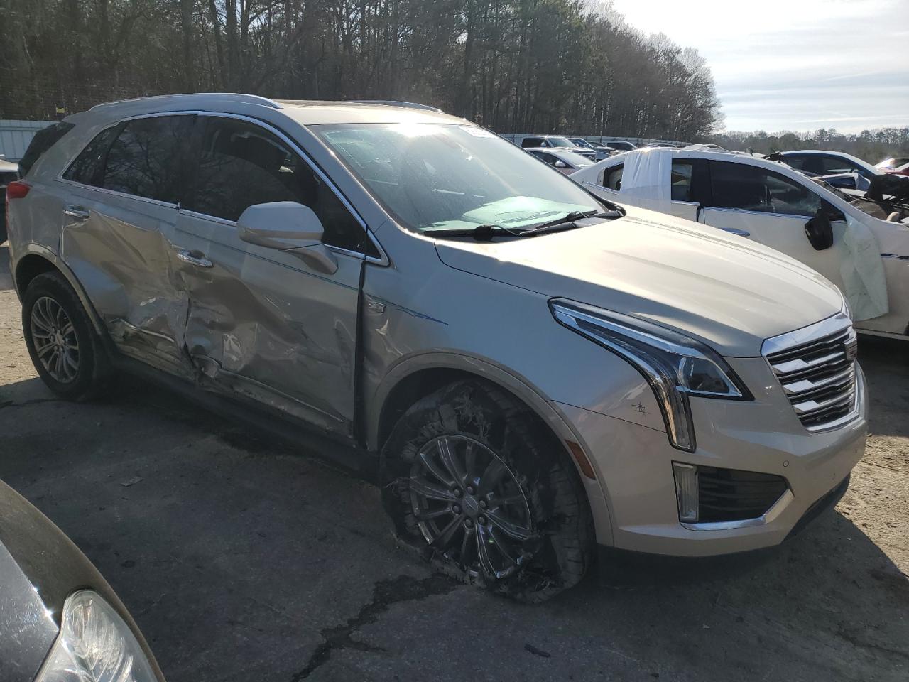 2017 Cadillac XT5 VIN 1GYKNDRS2HZ169850 Copart auction photo, side damage thumbnail 4