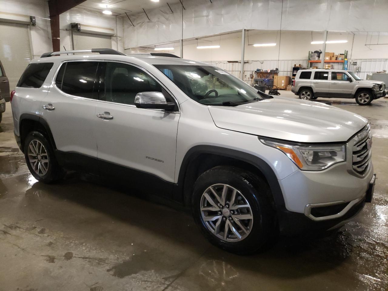 2017 GMC Acadia VIN 1GKKNSLA7HZ286483 Copart auction photo, front end / side damage thumbnail 4