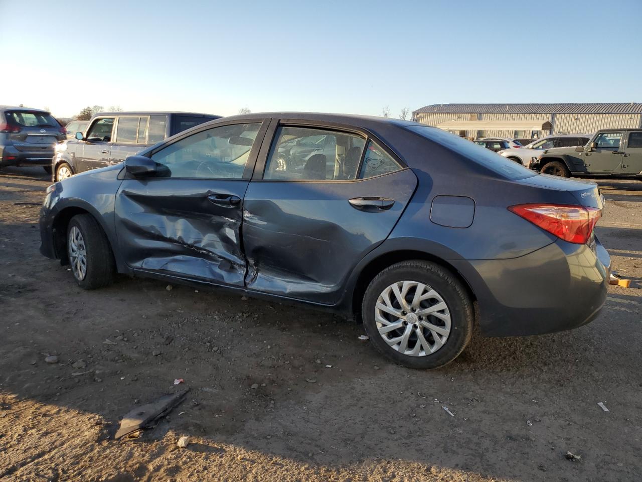 2018 Toyota Corolla VIN 2T1BURHE4JC086681 Copart auction photo, side / front end damage thumbnail 2