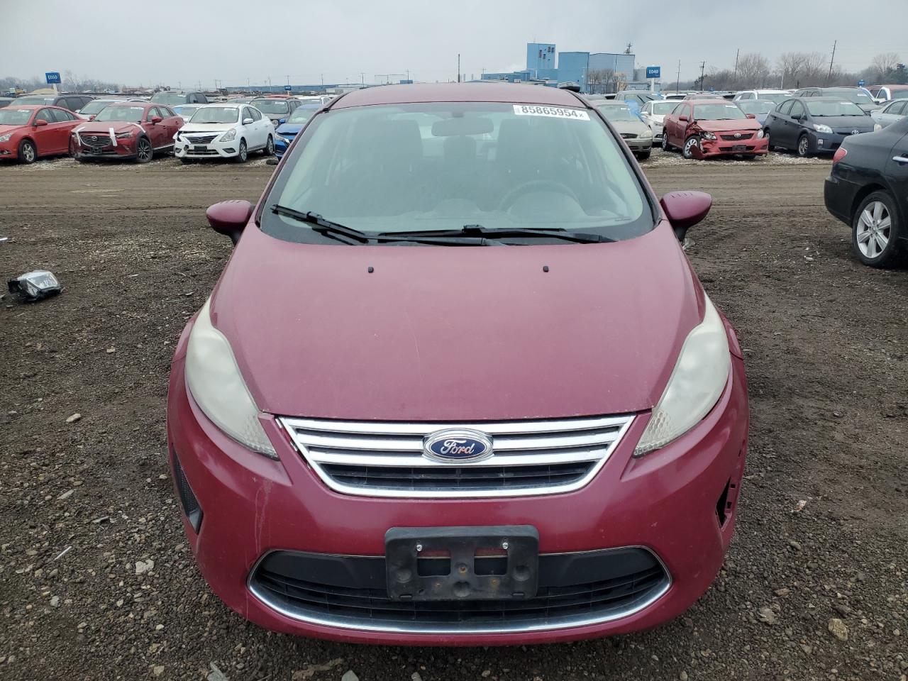 2011 Ford Fiesta VIN 3FADP4BJ7BM226147 Copart auction photo, all over damage thumbnail 5