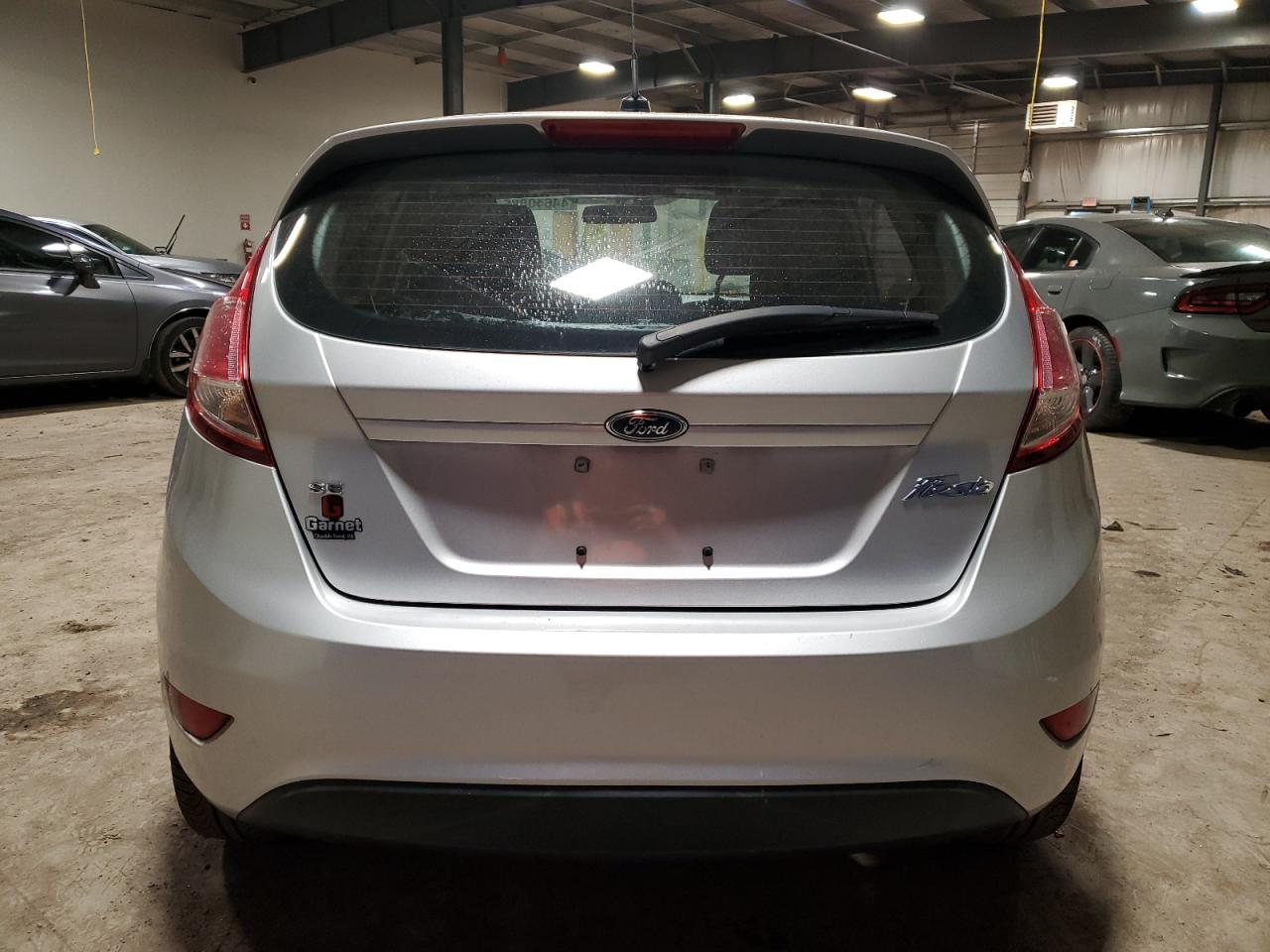 2017 Ford Fiesta VIN 3FADP4EJ1HM139798 Copart auction photo, side / rear end damage thumbnail 6