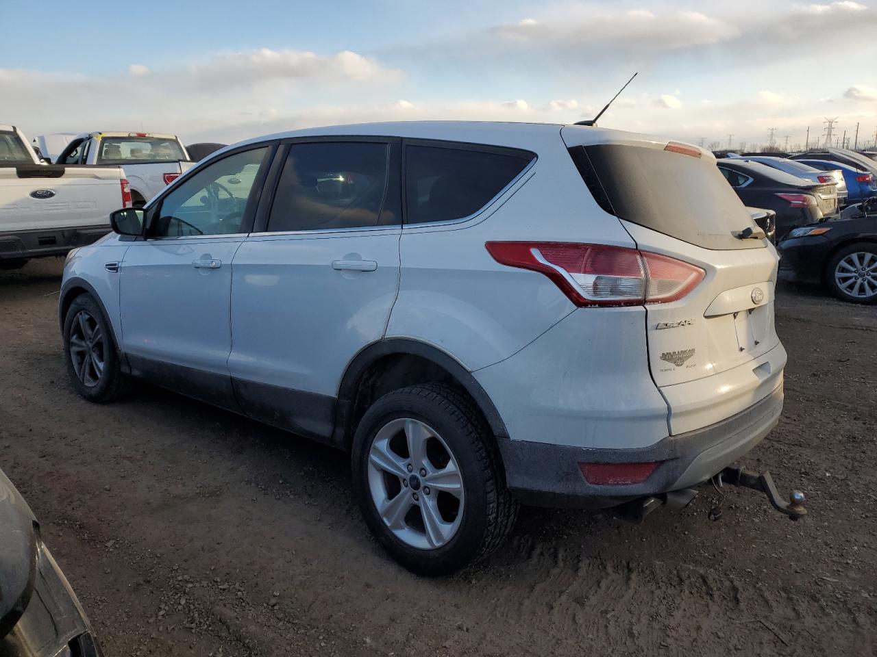 2015 Ford Escape VIN 1FMCU0G72FUB89882 Copart auction photo, minor dent/scratches / undercarriage damage thumbnail 2