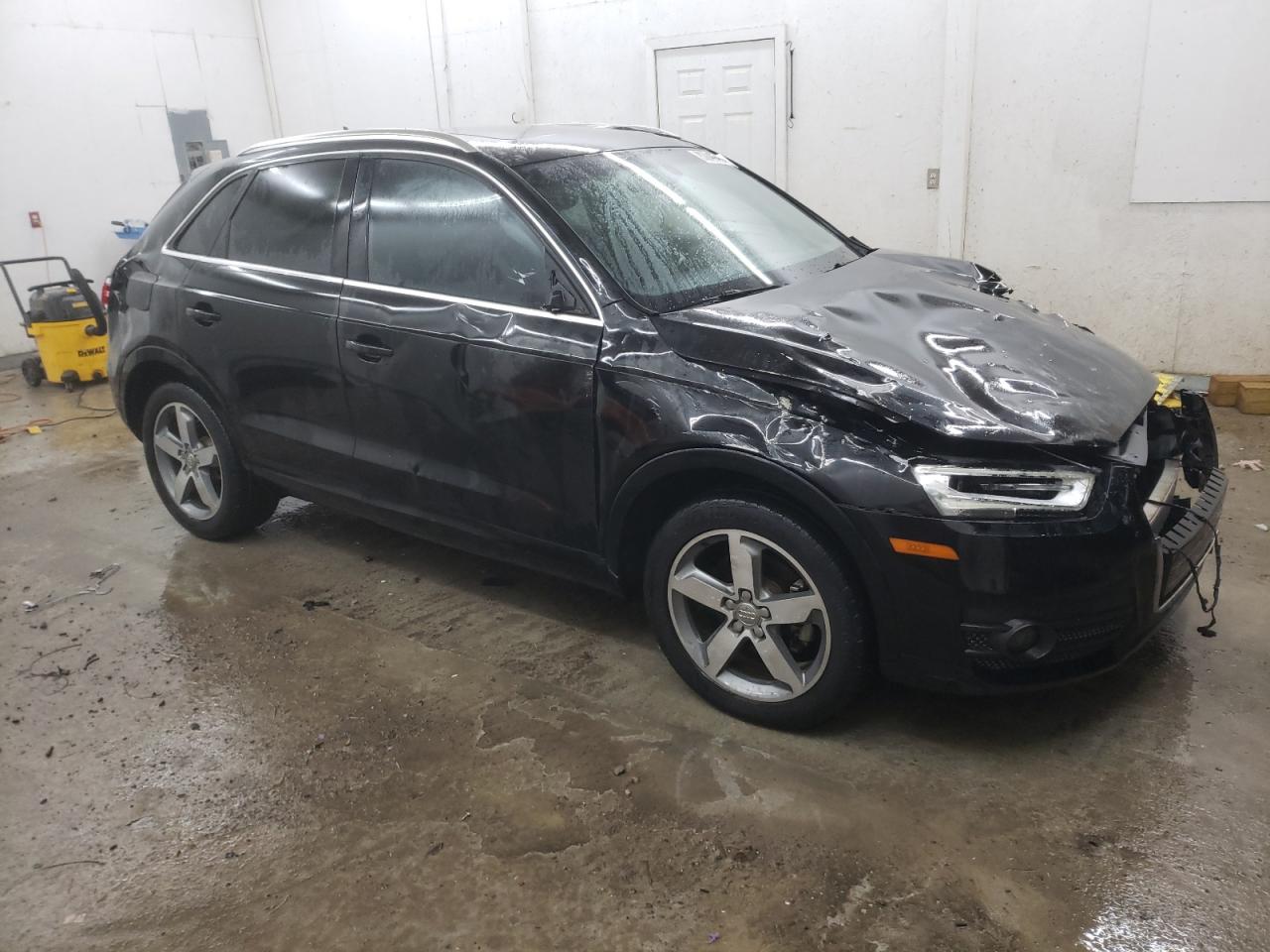 2015 Audi Q3 VIN WA1GFCFS6FR010439 Copart auction photo, rollover damage thumbnail 4