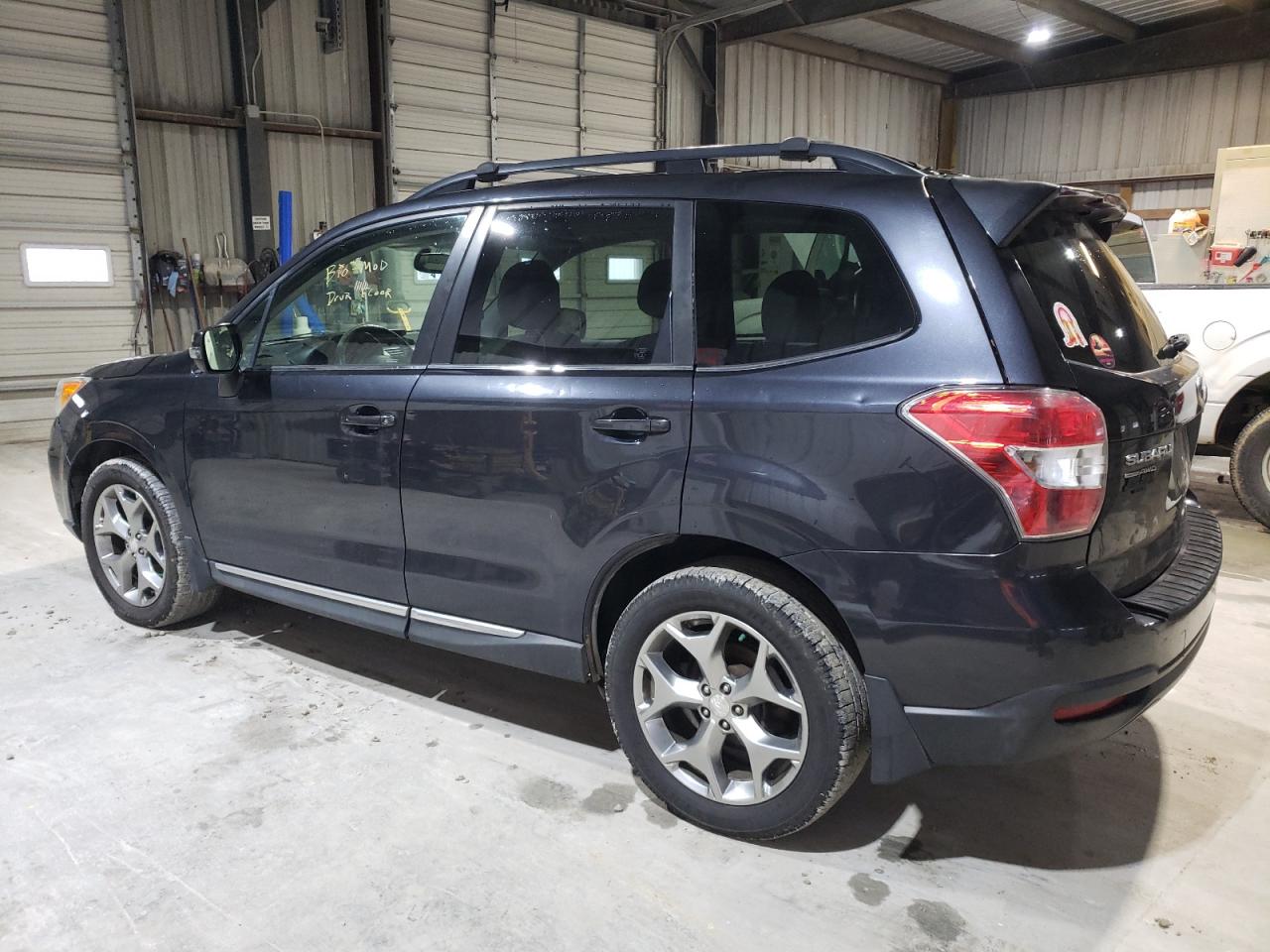 2015 Subaru Forester VIN JF2SJAUC0FH581219 Copart auction photo, hail / minor dent/scratches damage thumbnail 2