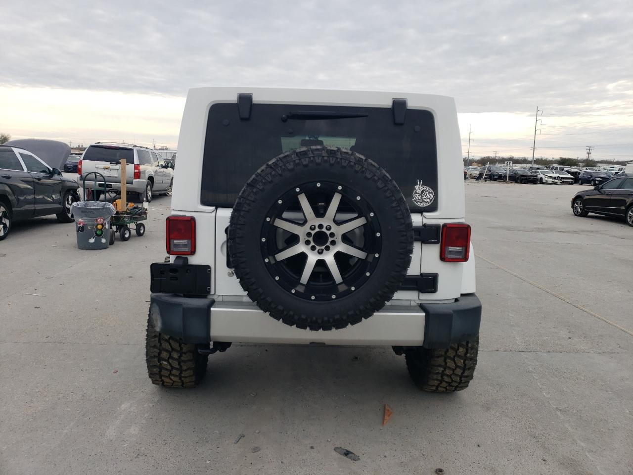 2017 Jeep Wrangler VIN 1C4BJWEGXHL700598 Copart auction photo, side damage thumbnail 6