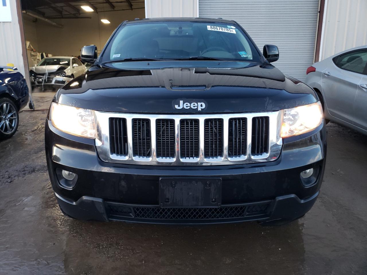 2012 Jeep Grand Cherokee VIN 1C4RJFAG2CC316084 Copart auction photo, side damage thumbnail 5