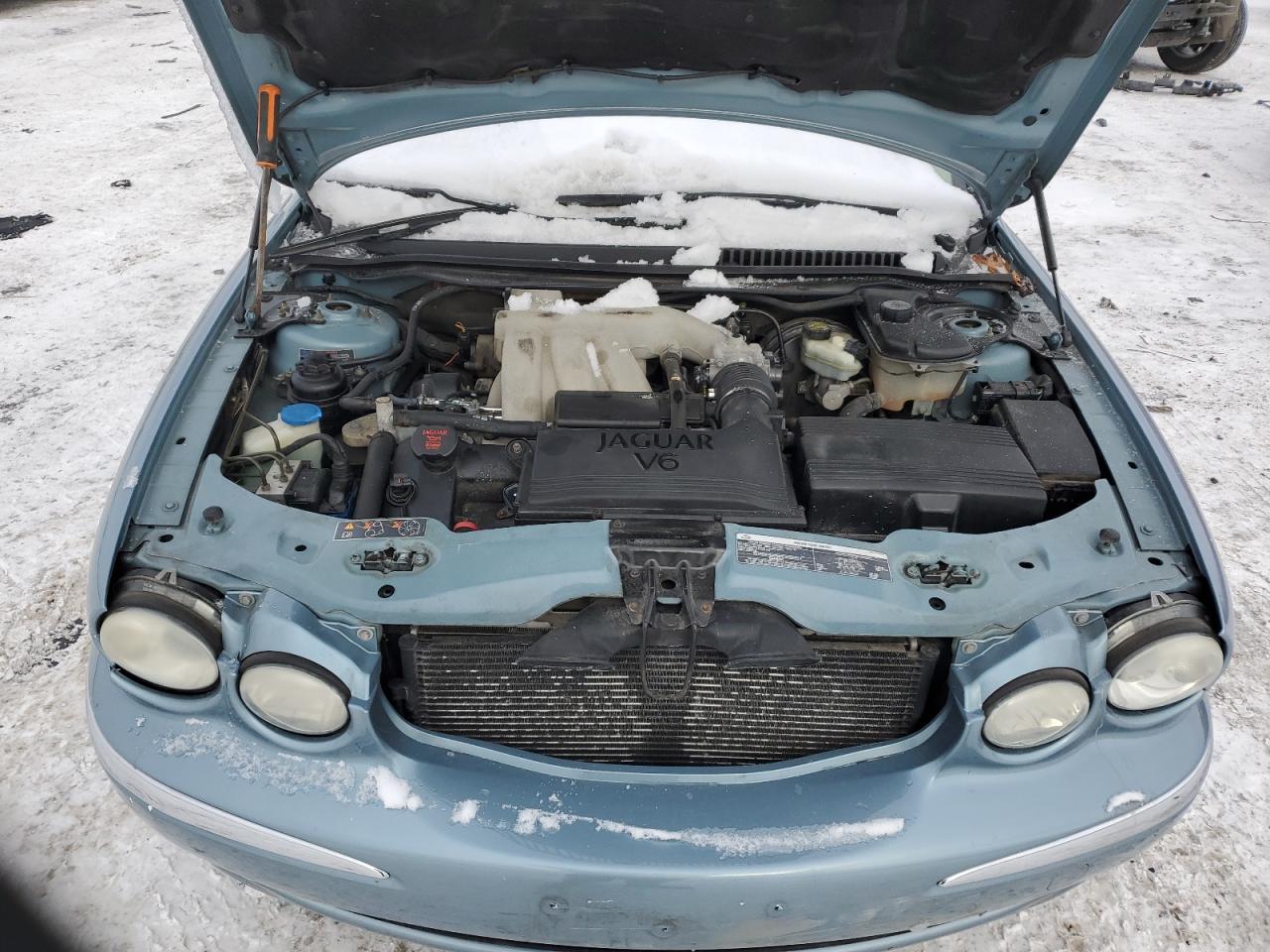 2004 Jaguar X-Type VIN SAJEA51C34WD97350 Copart auction photo, side / rear end damage thumbnail 12