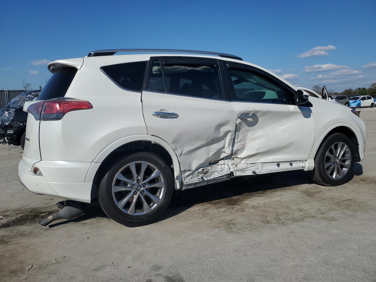 2017 Toyota RAV 4 VIN 2T3YFREVXHW340970 Copart auction photo, side damage thumbnail 3