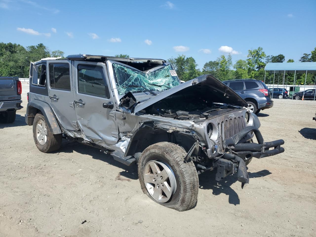 2015 Jeep Wrangler VIN 1C4BJWDG4FL546355 Copart auction photo, all over damage thumbnail 4