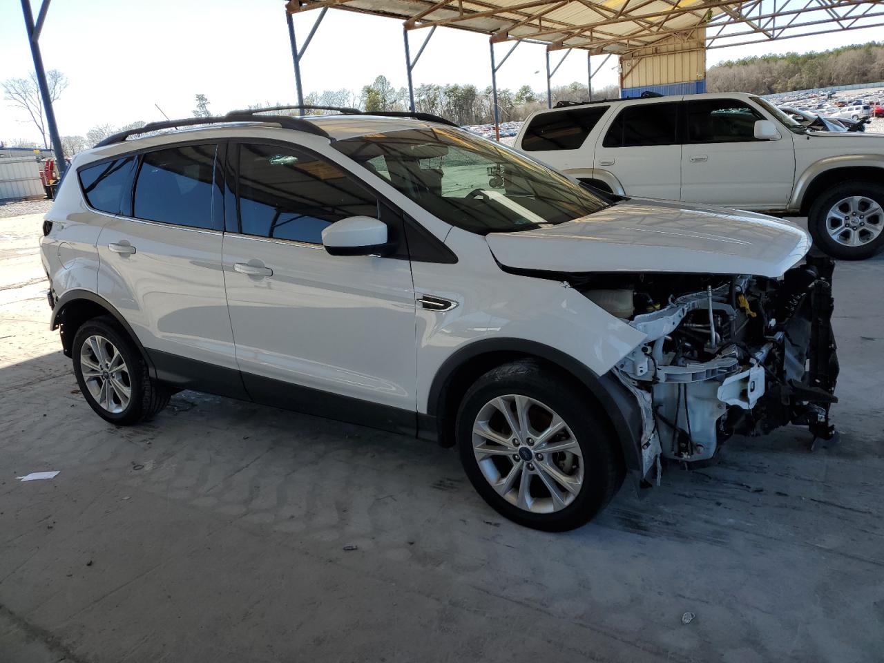 2017 Ford Escape VIN 1FMCU0GD8HUC59443 Copart auction photo, front end / rear end damage thumbnail 4