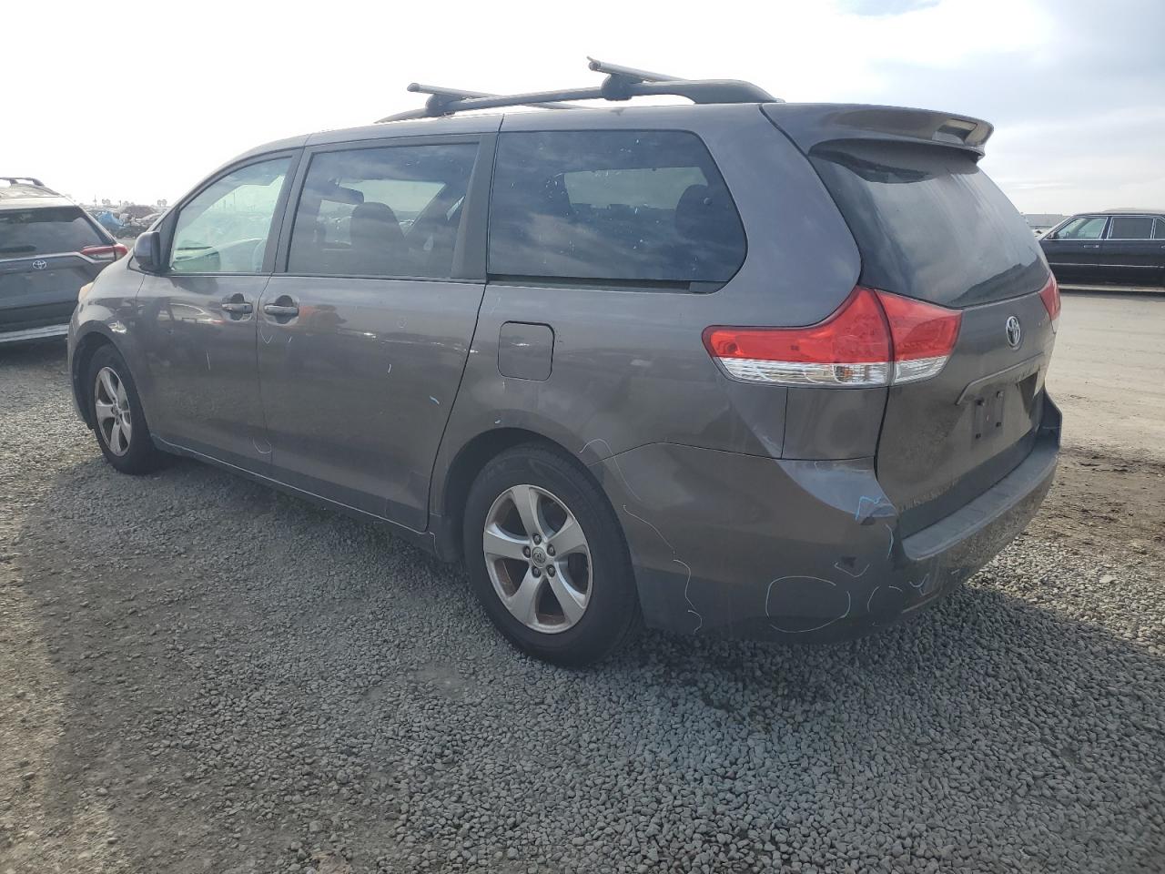 2014 Toyota Sienna VIN 5TDKK3DC9ES477331 Copart auction photo, all over damage thumbnail 2