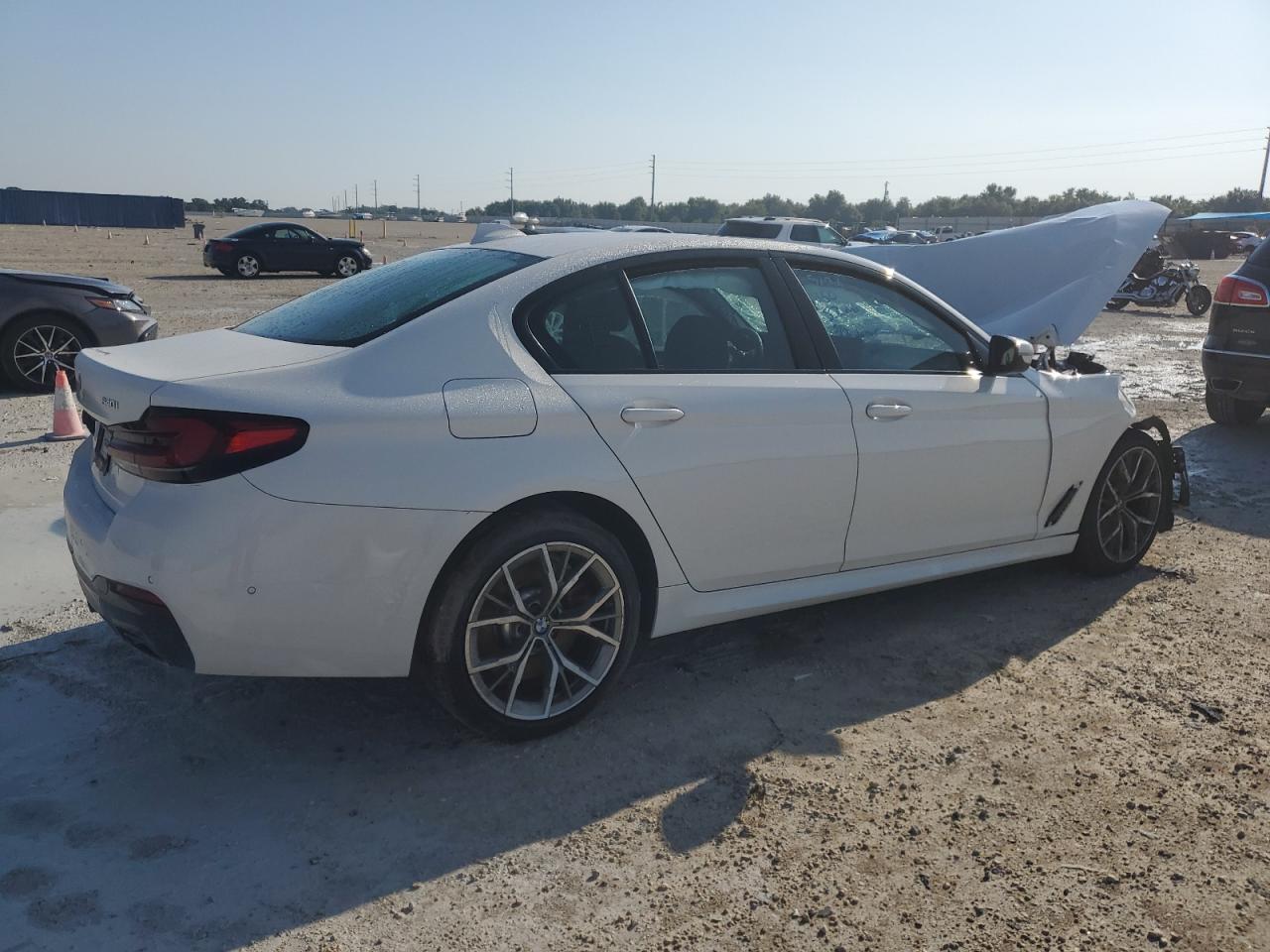 2022 BMW 5er VIN WBA73BJ00NCJ89882 Copart auction photo, front end / top/roof damage thumbnail 3