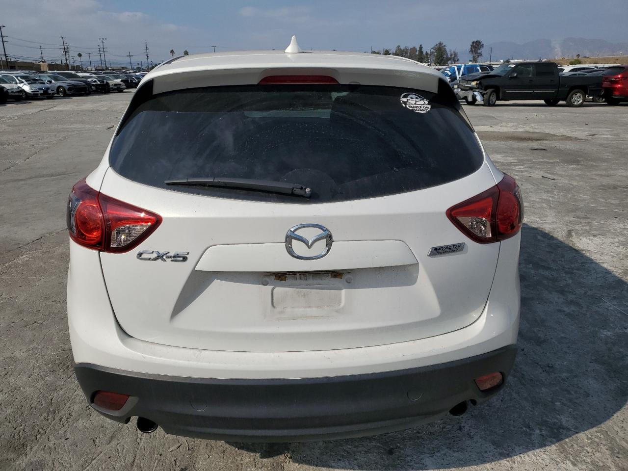 2016 Mazda CX-5 VIN JM3KE2CYXG0786723 Copart auction photo, front end damage thumbnail 6