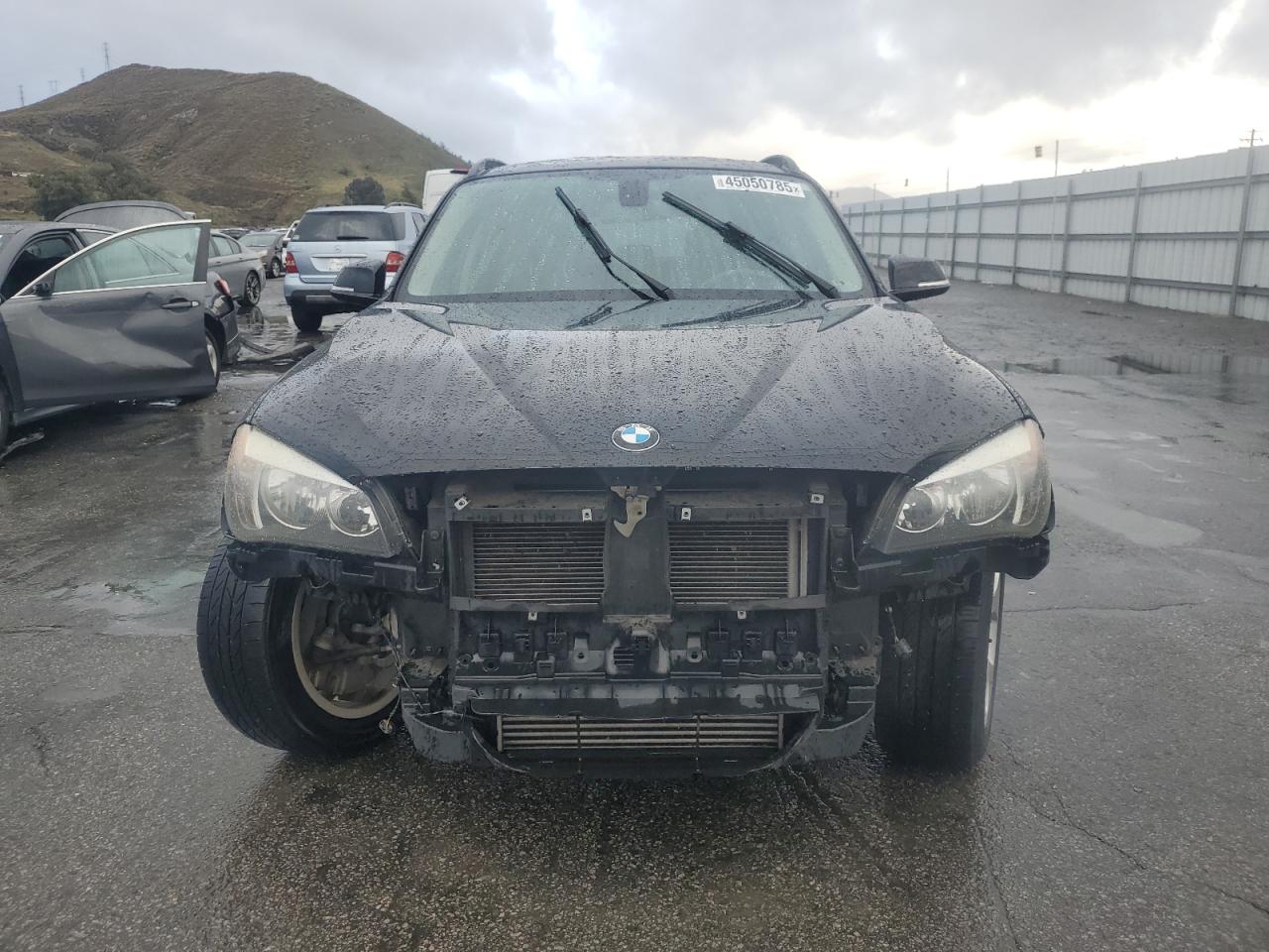 2015 BMW X1 VIN WBAVM1C55FVW56937 Copart auction photo, front end damage thumbnail 5
