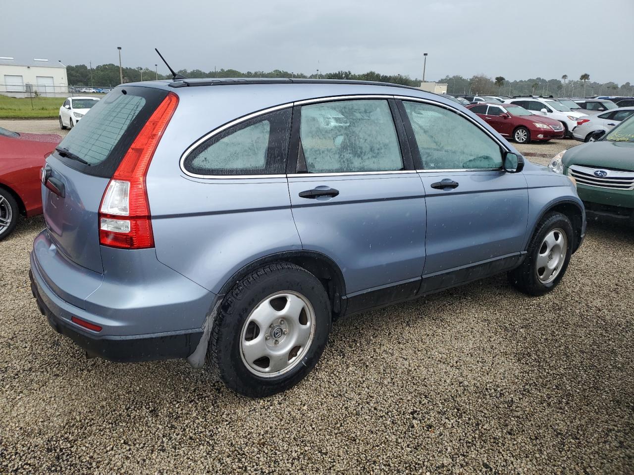 2010 Honda CR-V VIN 3CZRE3H32AG702059 Copart auction photo, water/flood damage thumbnail 3