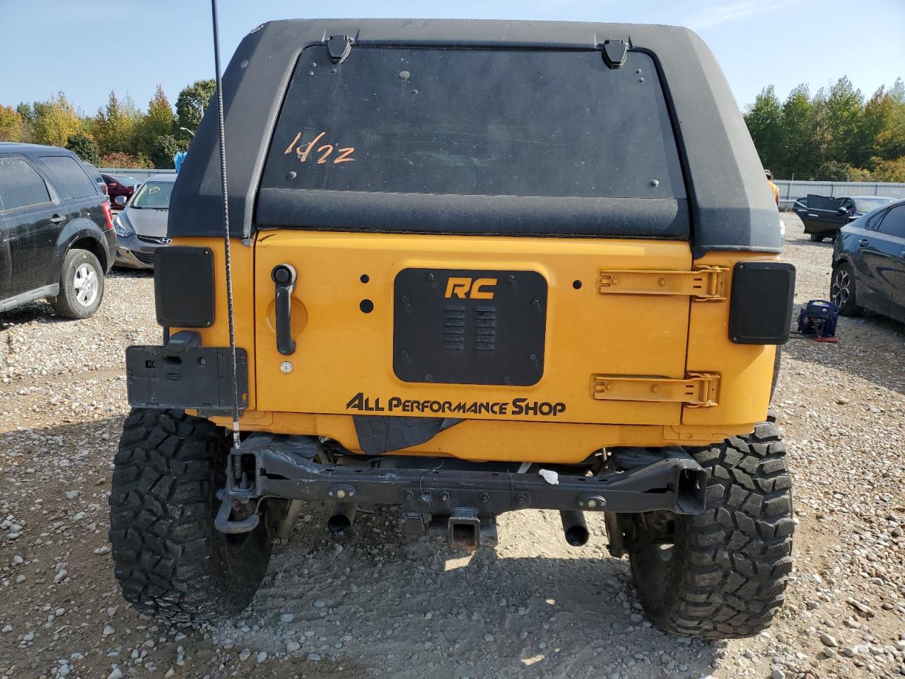 2012 Jeep Wrangler VIN 1C4BJWDG6CL129864 Copart auction photo, side / all over damage thumbnail 6