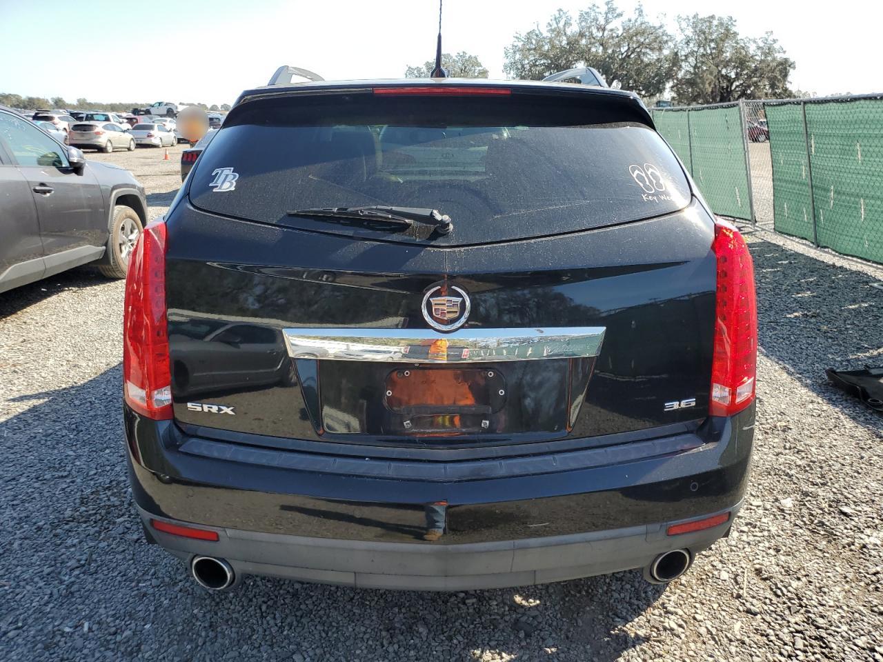 2012 Cadillac SRX VIN 3GYFNBE33CS589188 Copart auction photo, front end damage thumbnail 6