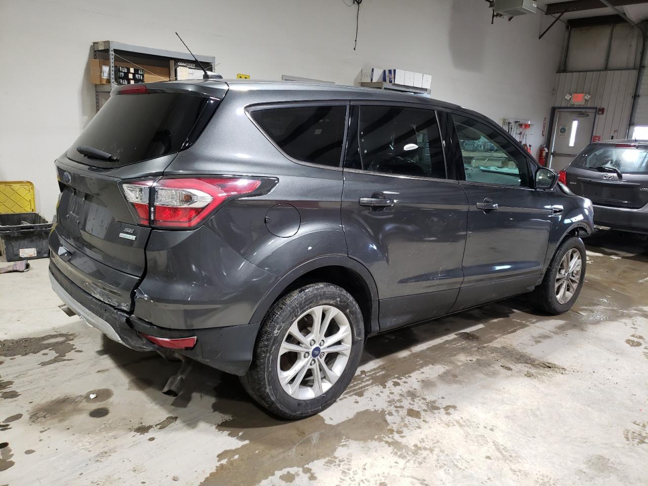 2017 Ford Escape VIN 1FMCU0GDXHUA20640 Copart auction photo, all over damage thumbnail 3