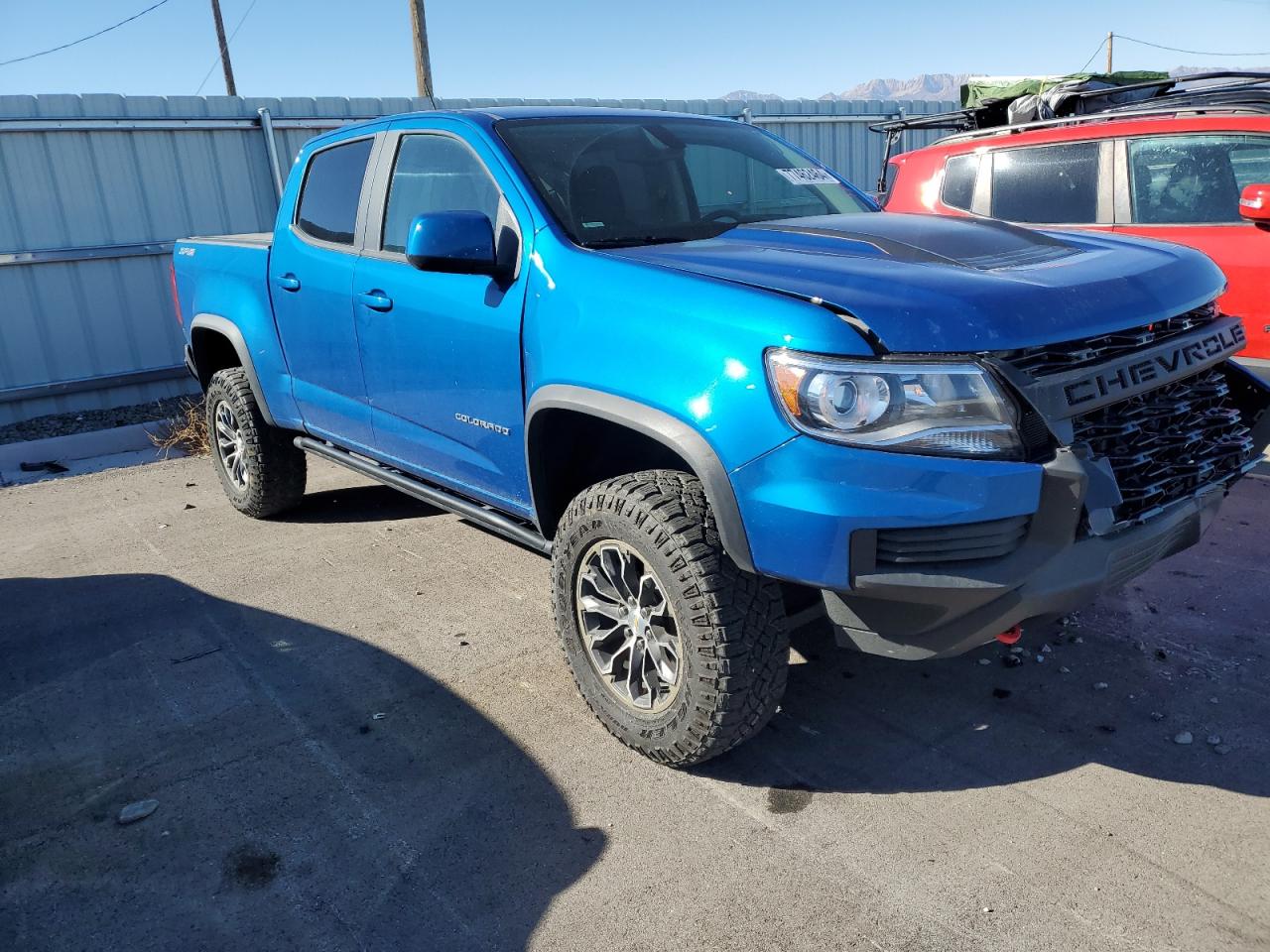 2021 Chevrolet Colorado VIN 1GCGTEEN0M1123191 Copart auction photo, front end / rear end damage thumbnail 4