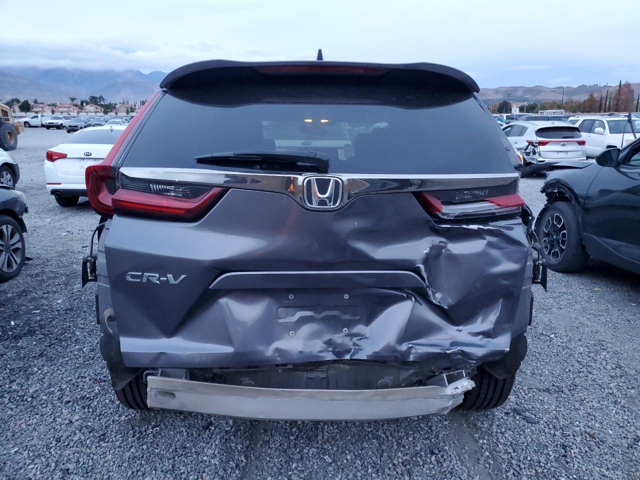2022 Honda CR-V VIN 2HKRW1H52NH407632 Copart auction photo, all over damage thumbnail 6