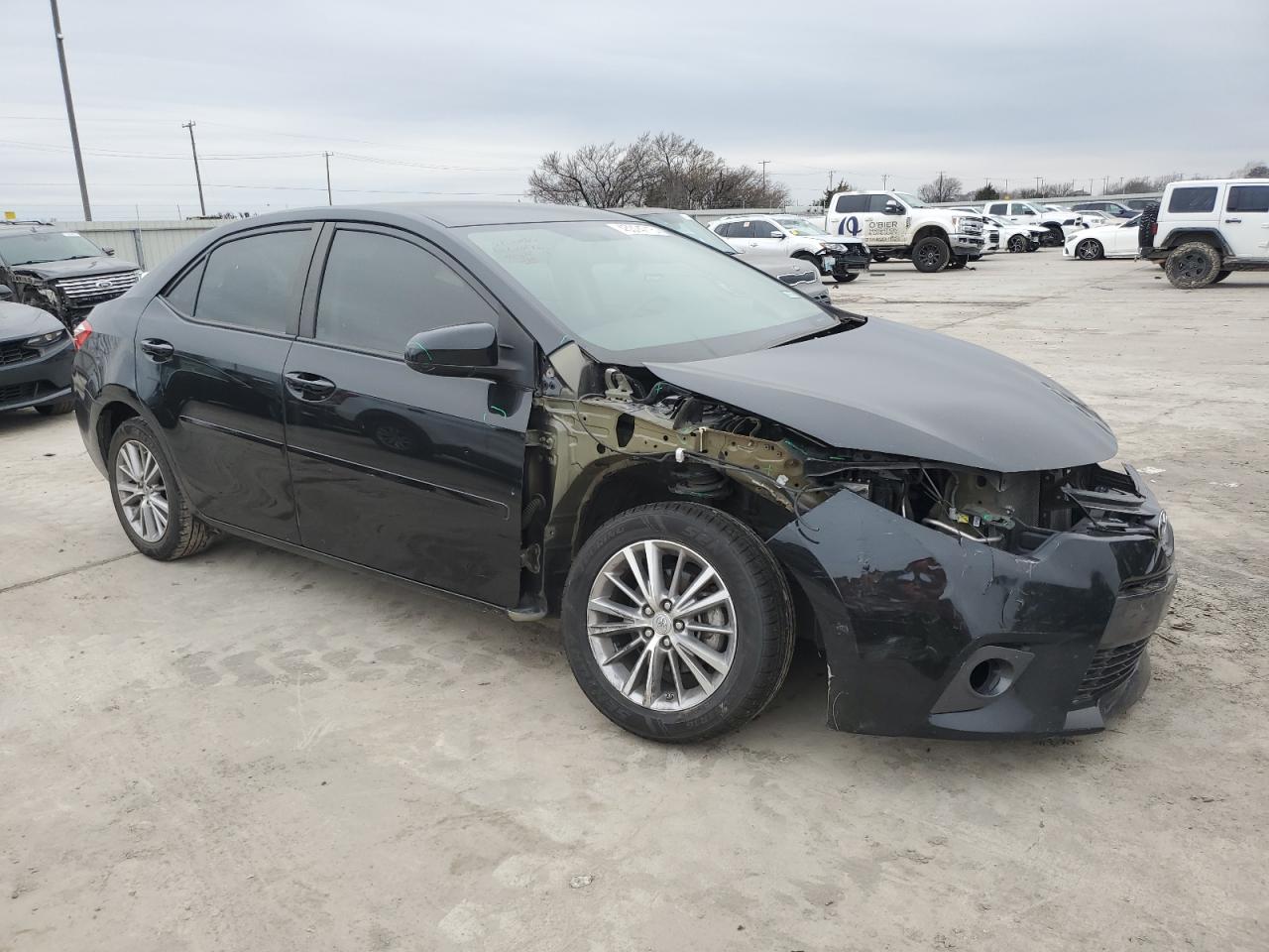 2015 Toyota Corolla VIN 5YFBURHEXFP224909 Copart auction photo, front end damage thumbnail 4