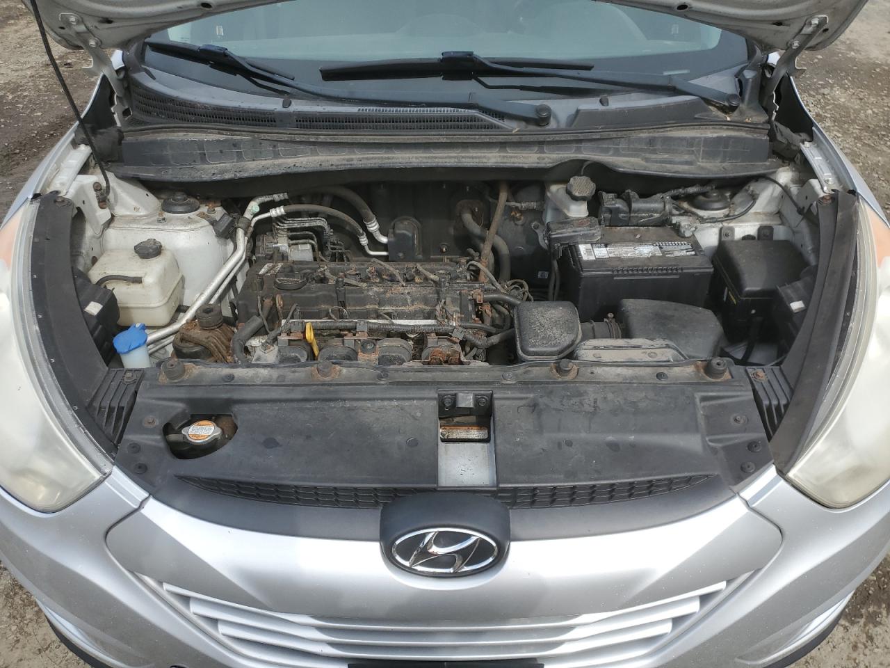 2010 Hyundai Tucson VIN KM8JT3AC1AU087838 Copart auction photo, minor dent/scratches damage thumbnail 12