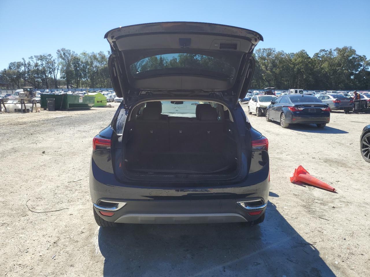 2021 Buick Envision VIN LRBFZMR46MD105023 Copart auction photo, side / rear end damage thumbnail 6
