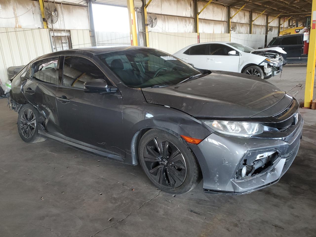 2017 Honda Civic VIN SHHFK7H53HU214666 Copart auction photo, side / rear end damage thumbnail 4