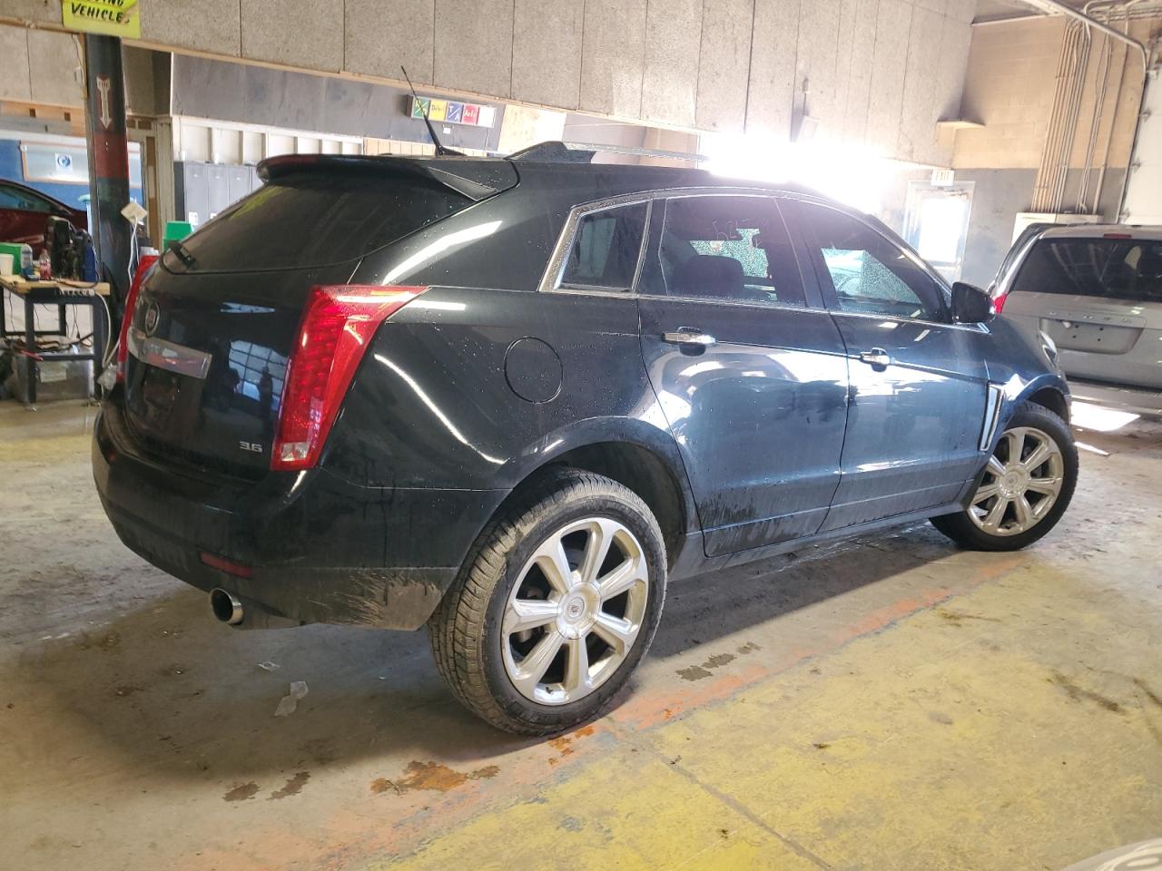 2013 Cadillac SRX VIN 3GYFNDE37DS526799 Copart auction photo, front end / minor dent/scratches damage thumbnail 3