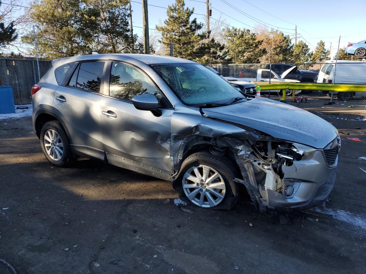 2014 Mazda CX-5 VIN JM3KE2CY4E0358577 Copart auction photo, front end / side damage thumbnail 4
