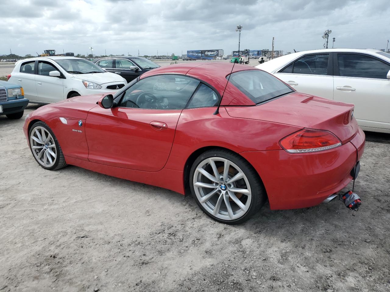 2009 BMW Z4 VIN WBALM73529E351054 Copart auction photo, water/flood damage thumbnail 2