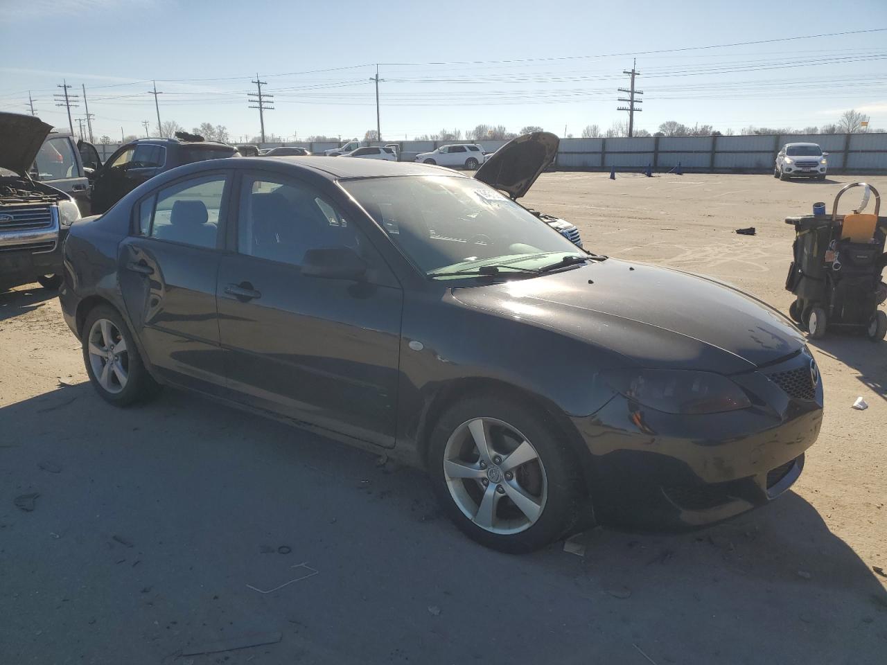 2006 Mazda 3 VIN JM1BK32FX61428070 Copart auction photo, side / rear end damage thumbnail 4
