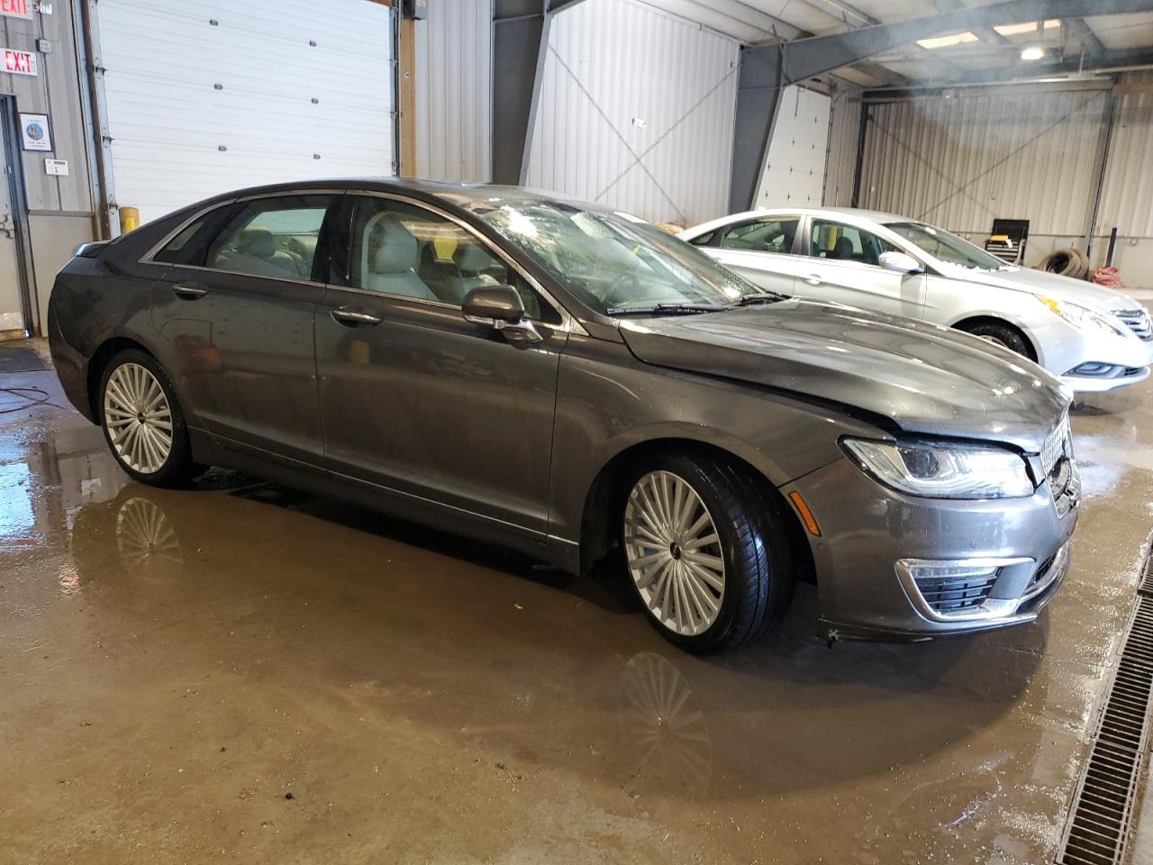 2017 Lincoln MKZ VIN 3LN6L5F99HR629736 Copart auction photo, front end / rear end damage thumbnail 4