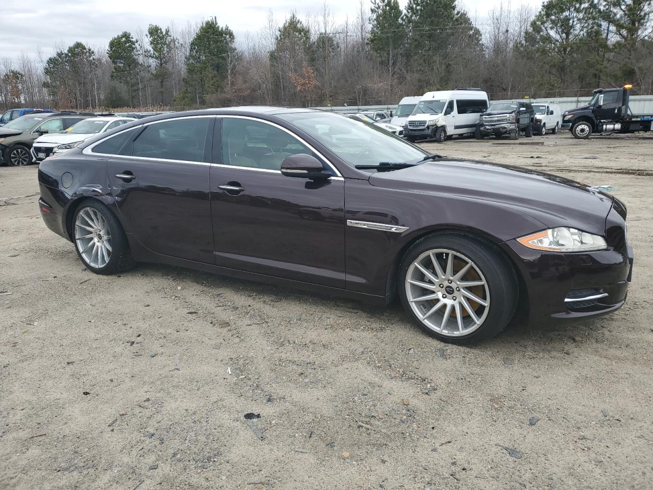 2011 Jaguar XJ VIN SAJWA2GB7BLV086 Copart auction photo, rear end / side damage thumbnail 4