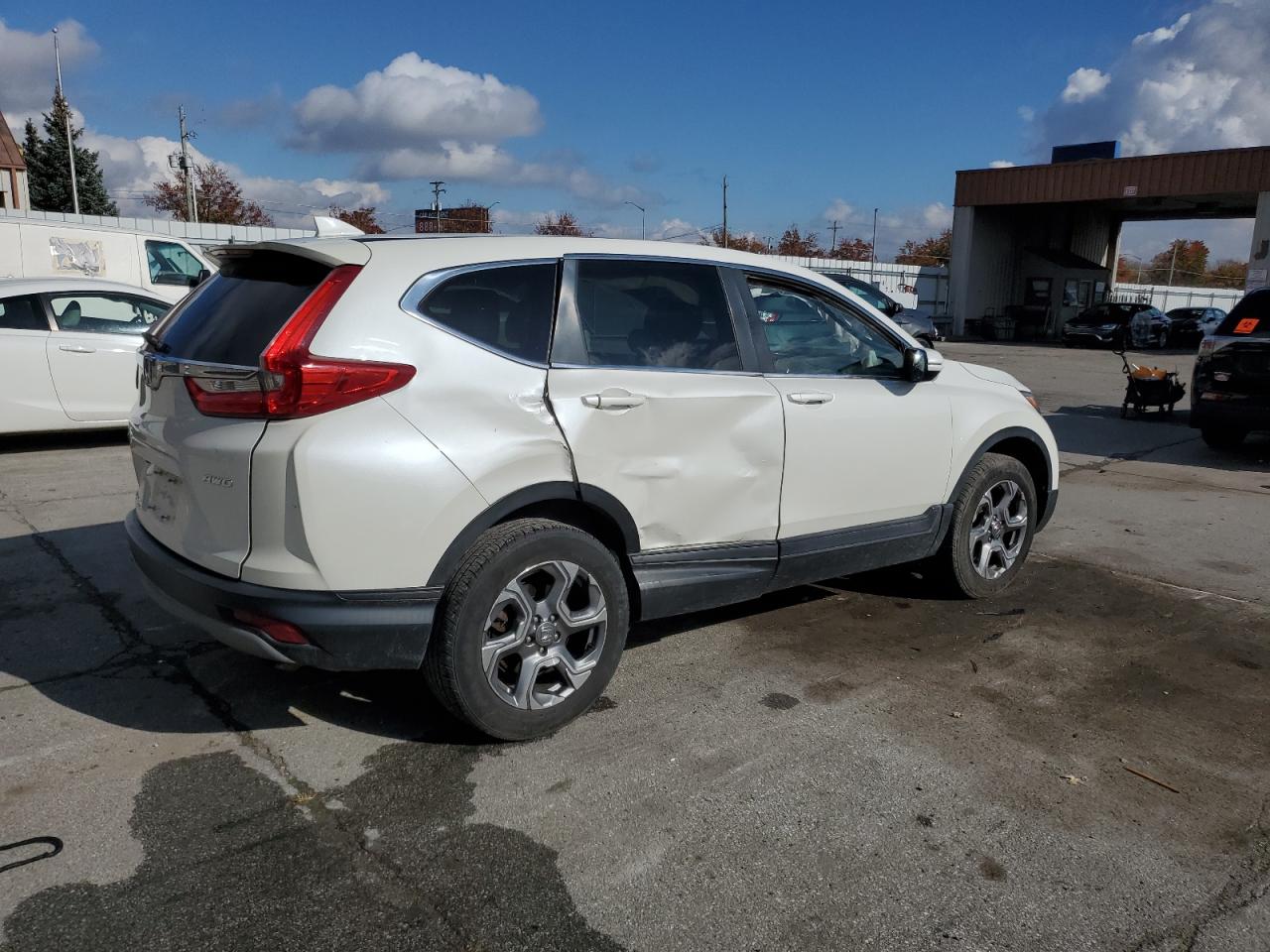 2018 Honda CR-V VIN 2HKRW2H86JH615295 Copart auction photo, side / rear end damage thumbnail 3