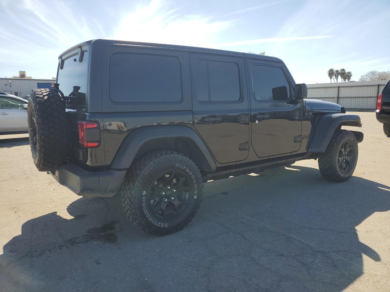 2021 Jeep Wrangler VIN 1C4HJXDNXMW665408 Copart auction photo, side / minor dent/scratches damage thumbnail 3