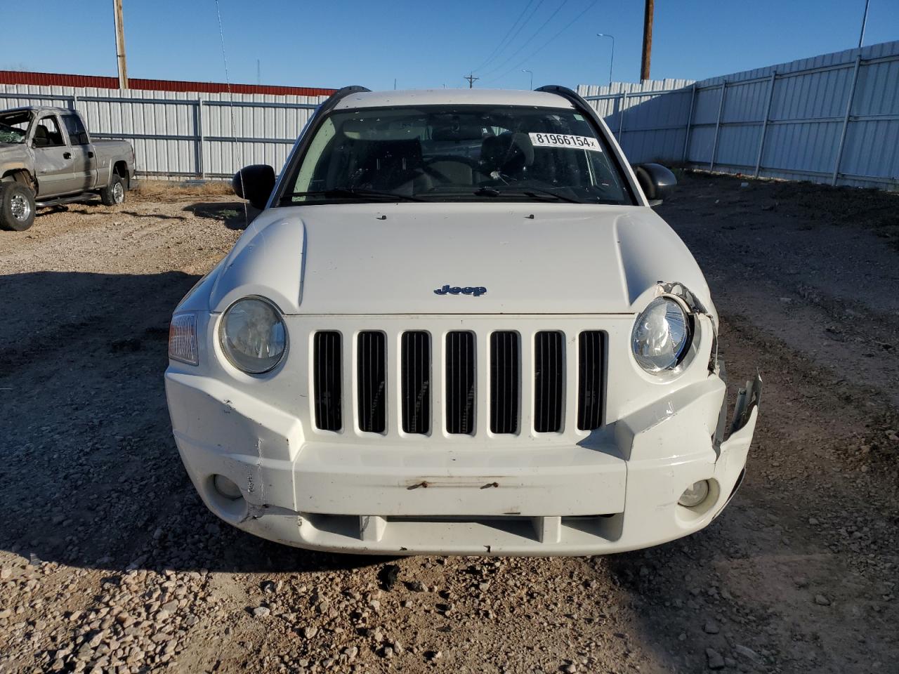 2010 Jeep Compass VIN 1J4NF4FB7AD503727 Copart auction photo, front end / side damage thumbnail 5