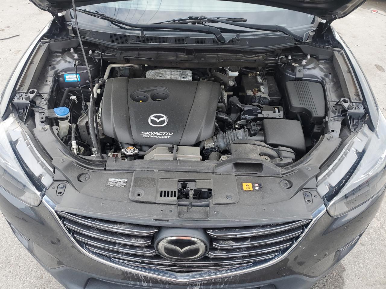 2016 Mazda CX-5 VIN JM3KE4DY5G0607837 Copart auction photo, minor dent/scratches damage thumbnail 12