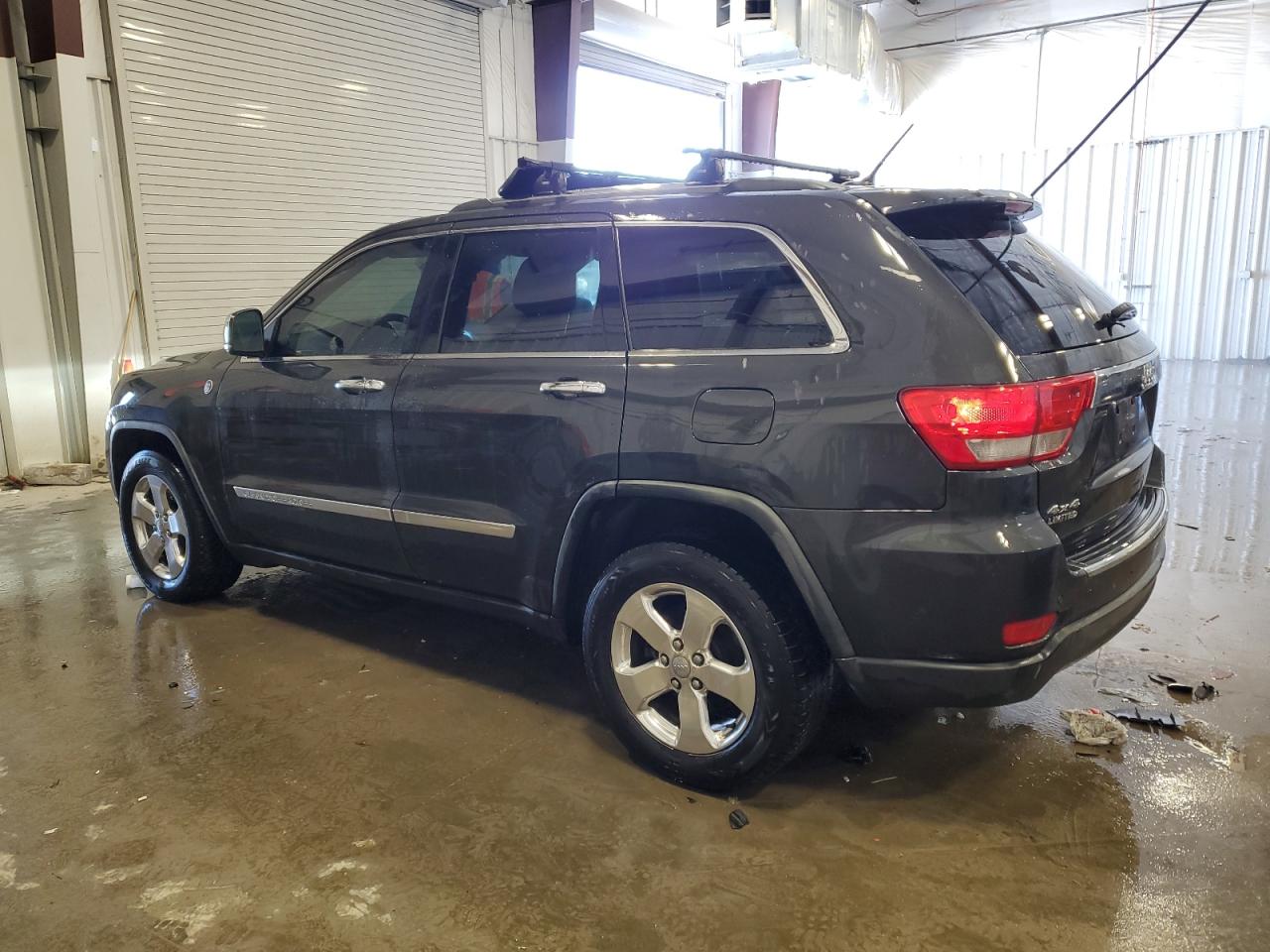 2011 Jeep Grand Cherokee VIN 1J4RR5GG7BC744381 Copart auction photo, side / front end damage thumbnail 2