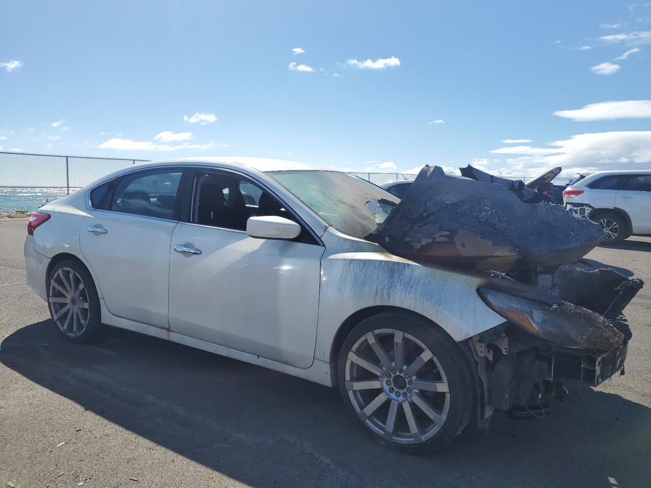 2016 Nissan Altima VIN 1N4AL3AP8GN371323 Copart auction photo, burn - engine damage thumbnail 4