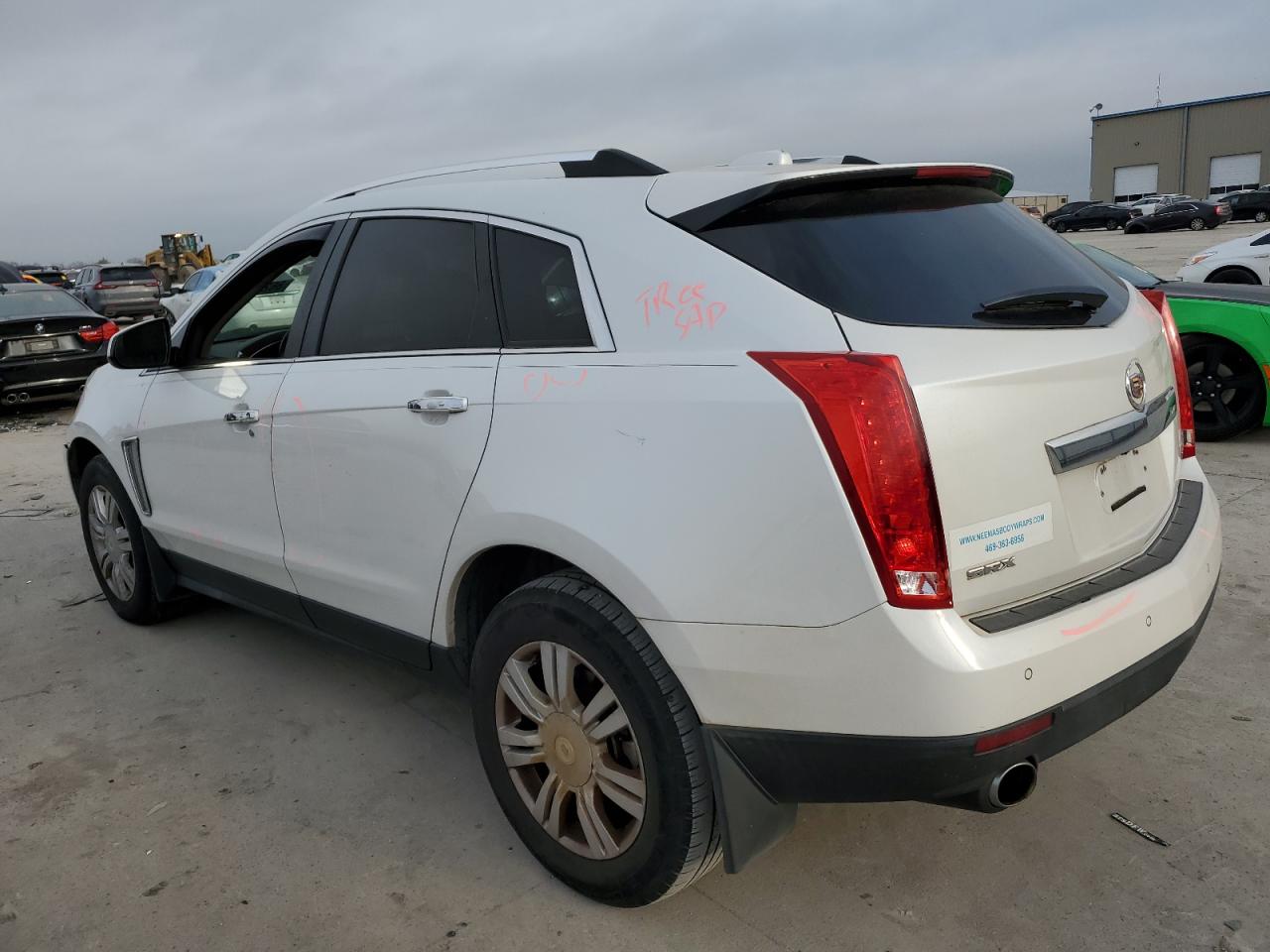 2015 Cadillac SRX VIN 3GYFNBE35FS613060 Copart auction photo, all over damage thumbnail 2