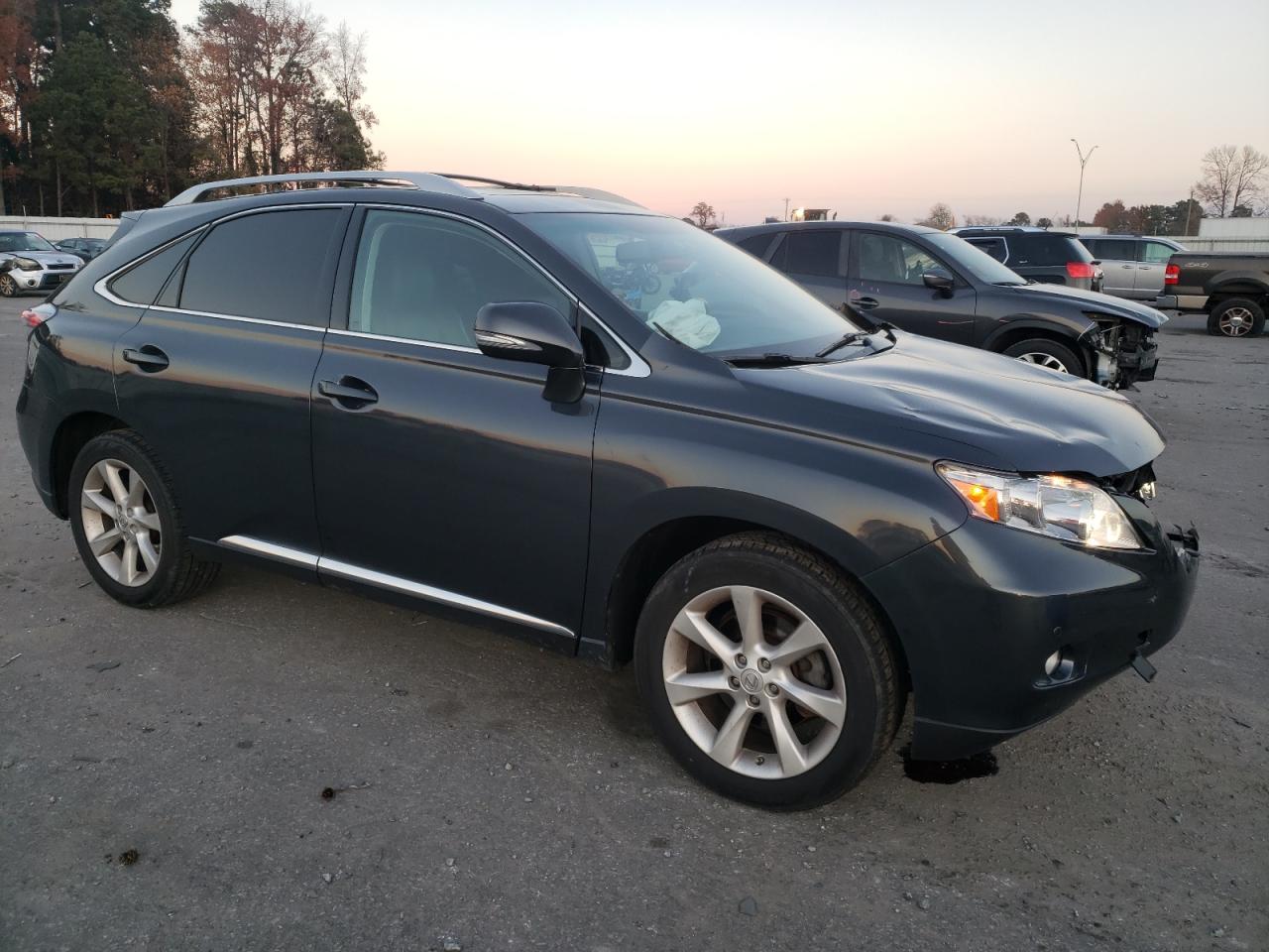 2010 Lexus RX VIN 2T2ZK1BAXAC030672 Copart auction photo, front end / top/roof damage thumbnail 4
