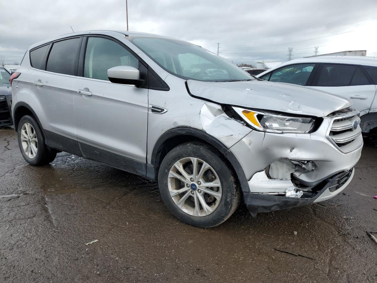 2019 Ford Escape VIN 1FMCU9GD8KUA69704 Copart auction photo, front end / side damage thumbnail 4