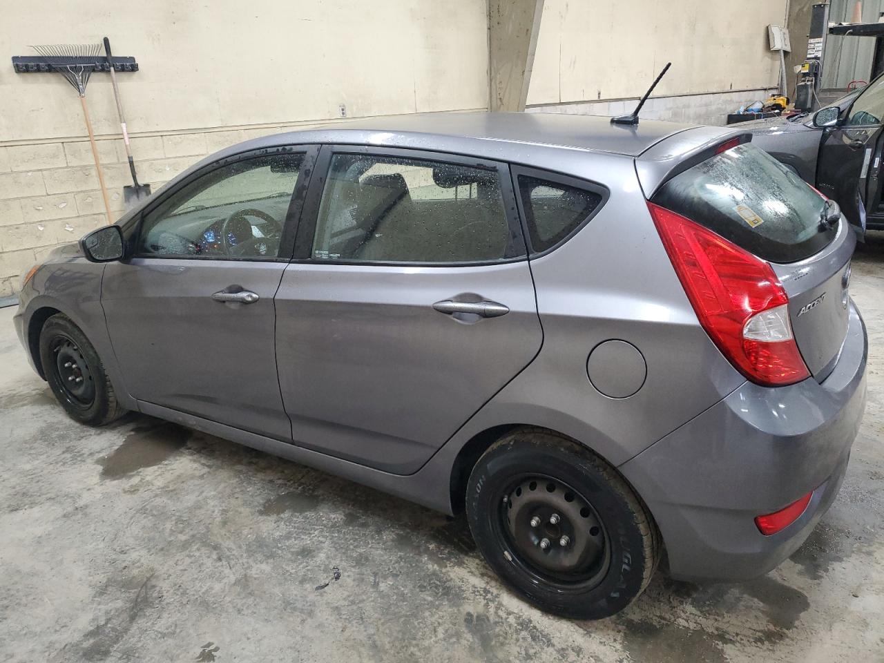 2014 Hyundai Accent VIN KMHCT5AE1EU165773 Copart auction photo, minor dent/scratches / undercarriage damage thumbnail 2