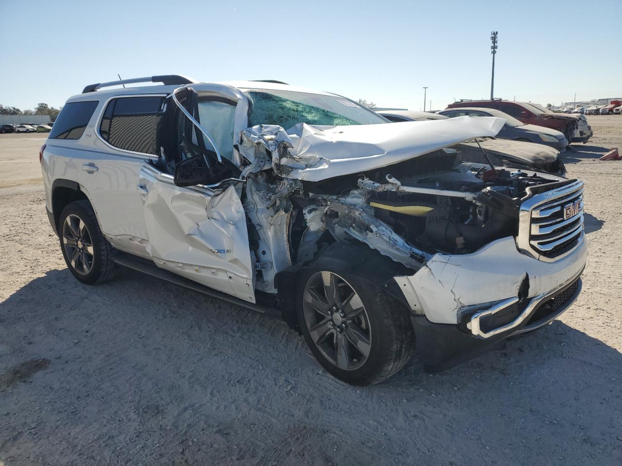 2017 GMC Acadia VIN 1GKKNNLS0HZ238611 Copart auction photo, front end / side damage thumbnail 4