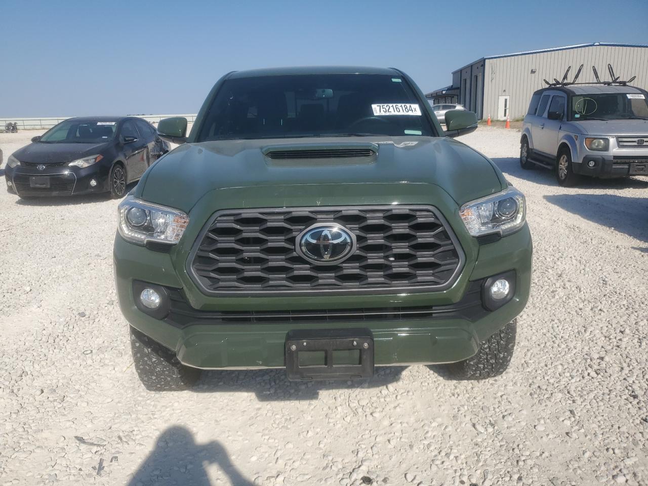 2021 Toyota Tacoma VIN 3TMAZ5CN5MM141891 Copart auction photo, side damage thumbnail 5
