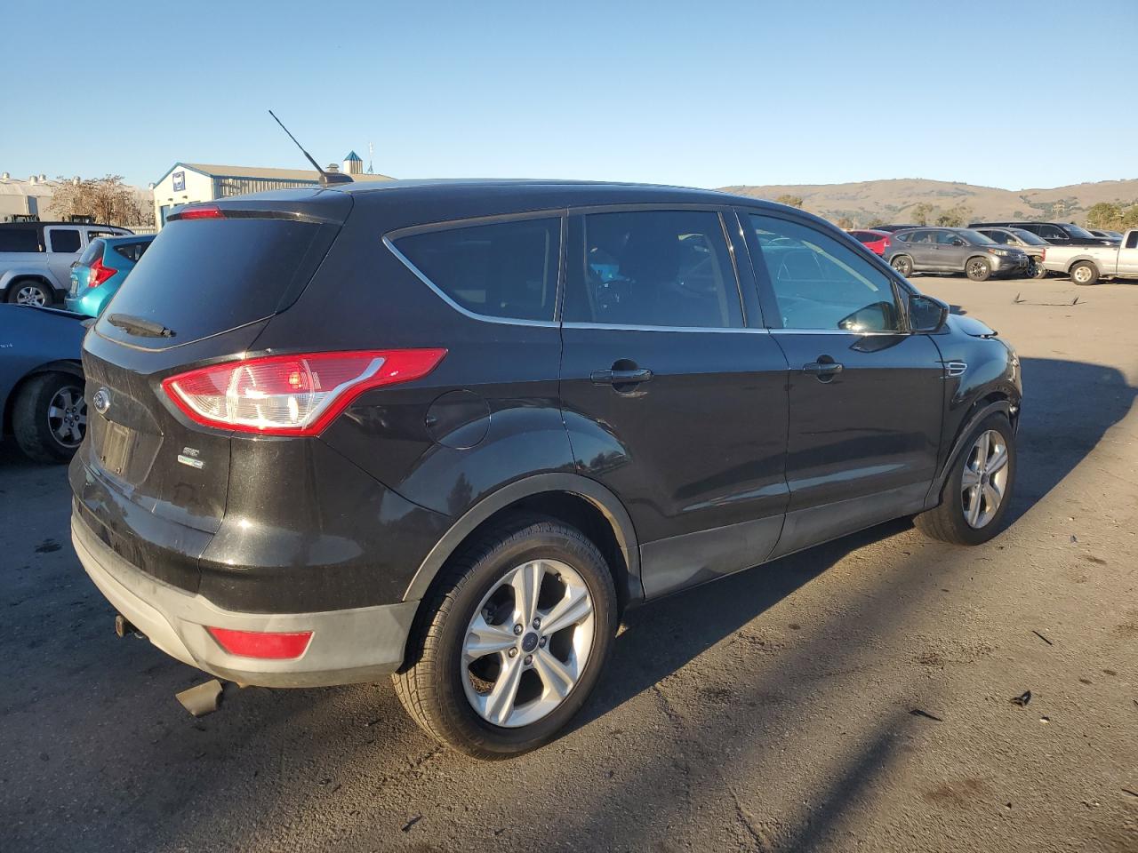 2015 Ford Escape VIN 1FMCU9GX9FUB63459 Copart auction photo, front end damage thumbnail 3