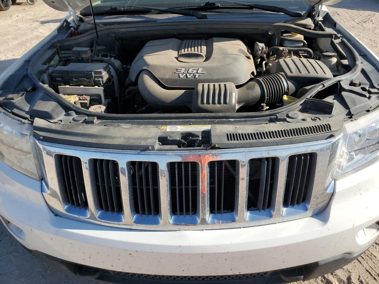 2012 Jeep Grand Cherokee VIN 1C4RJFAG0CC214847 Copart auction photo, all over / minor dent/scratches damage thumbnail 12