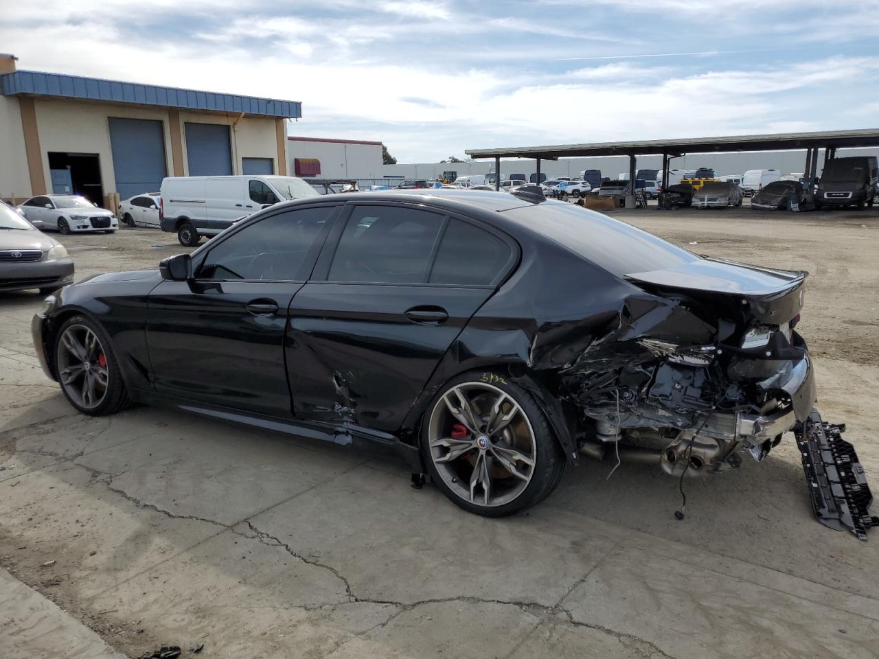 2023 BMW M5 VIN WBA13BK0XPCM98878 Copart auction photo, rear end / front end damage thumbnail 2