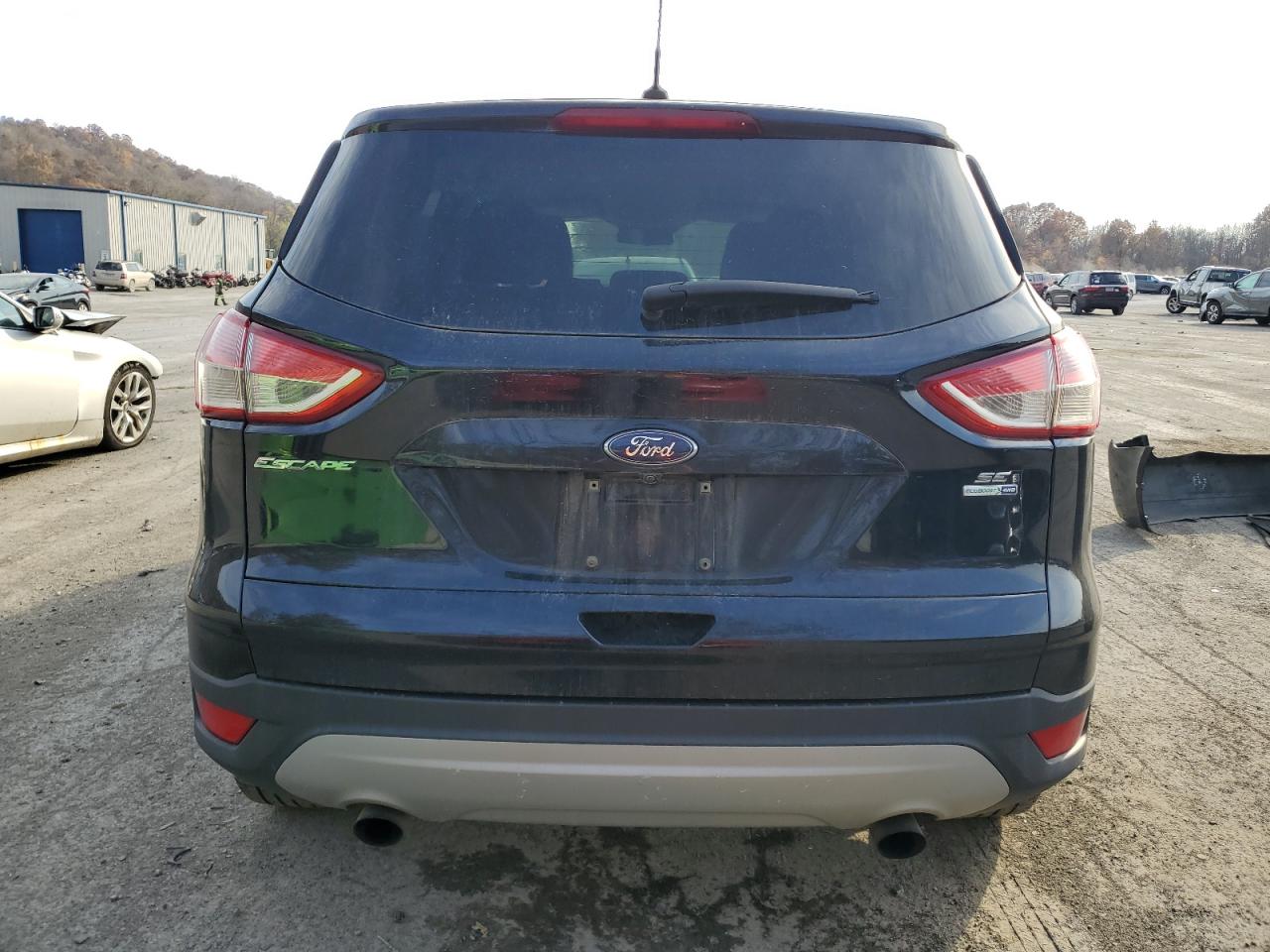 2016 Ford Escape VIN 1FMCU9GX3GUC86692 Copart auction photo, minor dent/scratches damage thumbnail 6